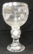 A George V and Queen Mary silver jubilee cut glass goblet inscribed "to commemorate the silver