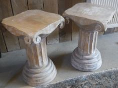 A pair of modern ionic column pedestals/stools