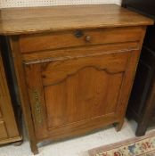 A 19th Century French pitch pine cupboard with single drawer of single door