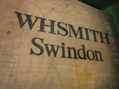 A collection of 14 various plastic crates each with wooden lid inscribed "WHSmith,