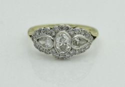 An 18 carat gold diamond-set ring,