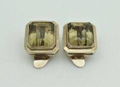 A pair of 14 carat gold mounted citrine clip-on earrings of square form,