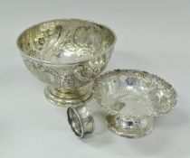 A late Victorian silver rose bowl of small proportions with embossed rose,