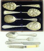 Two Georgian table spoons with later embossed berry decoration,