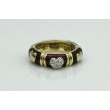 An 18 carat gold enamel and diamond set dress ring with love heart decoration, size M,