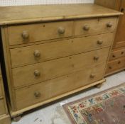 A Victorian pine chest of two short over three long drawers