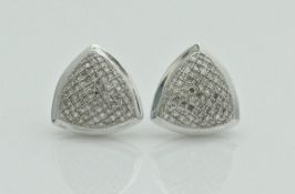 A pair of 9ct white gold triangular pave set ear studs