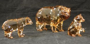 A Swarovski Crystal Society brown bear with two Swarovski Crystal Society cubs (boxed)