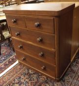 A late Victorian mahogany chest of two short over three long drawers together with a pair of
