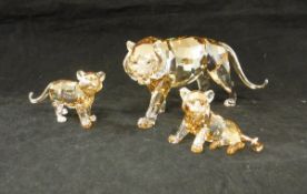 A Swarovski Crystal Society "Endanger Wildlife" coloured crystal tiger with two cubs 2010 (boxed)