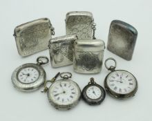 A collection of four 19th Century and later ladies Continental white metal cased pocket watches,