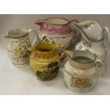 A collection of four early 19th Century English pottery jugs including a Sunderland lustre "British