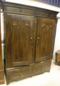 A stained pine armoire in the 19th Century French manner,