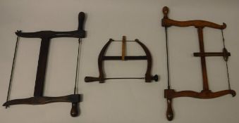 Three various vintage bow saws, one by E Preston 77 Lichfield St Birm,