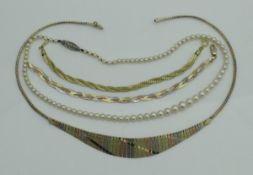 A late 20th Century 14 carat tri-coloured gold necklace of textured fan form,