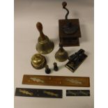 A collection of various items to include handbell inscribed "Fiddian", a smaller handbell,