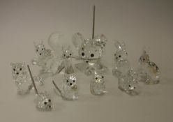 A collection of Swarovski Crystal animal figures to include mice with spring tails, cats,