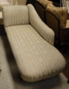 A late Victorian upholstered scroll end chaise longue