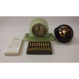 A box containing various costume jewellery, miniature brass abacus,