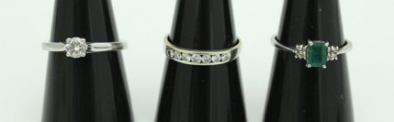 A white metal diamond solitaire ring, the stone approx 0.