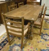 A set of six Old Charm ladder back dining chairs (4 plus 2 carvers) and an oak refectory style