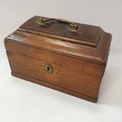 A late 18th Century Dutch mahogany tobacco box of tea caddy form with brass swan neck handle,