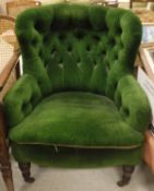 A Victorian button upholstered wing back arm chair,