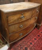 An early 19th Century mahogany bow fronted chest of two short over two long drawers