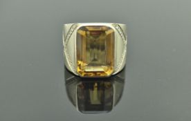 A large 18 carat gold topaz and diamond set ring, size R/S, total weight approx 23.