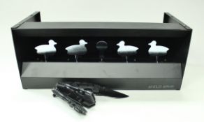 A magnetic Knockdown Duck Target game by Anglo Arms and a set of four folding knives