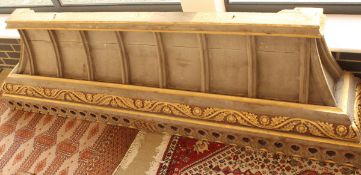 A late Victorian oak cornice or over mantle with carved painted and gilded decoration in the manner
