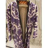 An Uzbekistan Chapan of purple colour Ikat CONDITION REPORTS Fading and