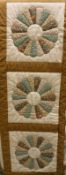 A late 20th Century handmade quilt of Dresden plate pattern, of cream,