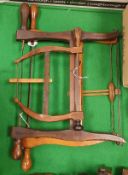 Three various vintage bow saws, one by E Preston 77 Lichfield St Birm,