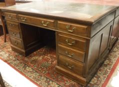 A circa 1900 mahogany double pedestal kneehole desk,