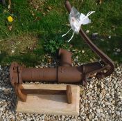 A cast iron garden pump inscribed "4" to the base,