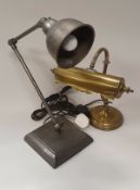 A brass student's lamp, another adjustable metal lamp, barley-twist brass table lamp,