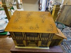 An early/mid 20th Century German painted timber framed doll's house