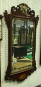 An Edwardian mahogany fretwork carved mirror in the 18th Century manner