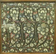 A 18th/19th Century Persian needlework depicting floral sprays with red, blue,