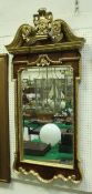 A pair of walnut and gilt framed mirrors in the George II taste CONDITION REPORTS