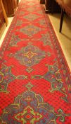 A modern Axminster runner, the Turkish style design in blue, red and green,