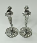 A pair of pewter candlesticks in the Art Nouveau style,