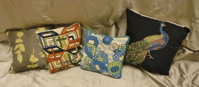 Three boxed of scatter cushions to include one decorated with geometric pattern needle work design