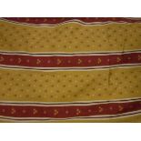 Two pairs of cotton twill yellow and red striped with floral motifs curtains, interlined,