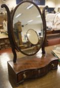A 19th Century toilet mirror the oval plate,