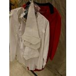 A red hunting tailcoat with Cotswold Hunt buttons,