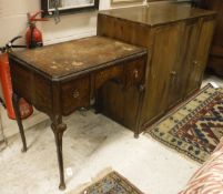 A pine two-door cupboard and walnut writing table,