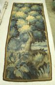 A 19th Century needlework panel depicting a tree in blue,