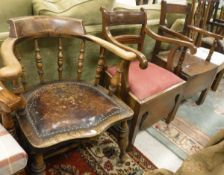 A Victorian smokers bow chair and two commode arm chairs